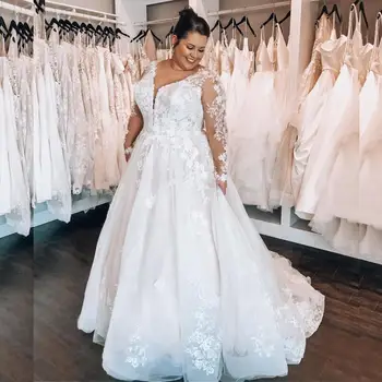 קו לבן שמלות חתונה גודל פלוס אשליה שרוולים ארוכים אפליקציות תחרה באורך רצפת שמלות כלה לנשים בהתאמה אישית